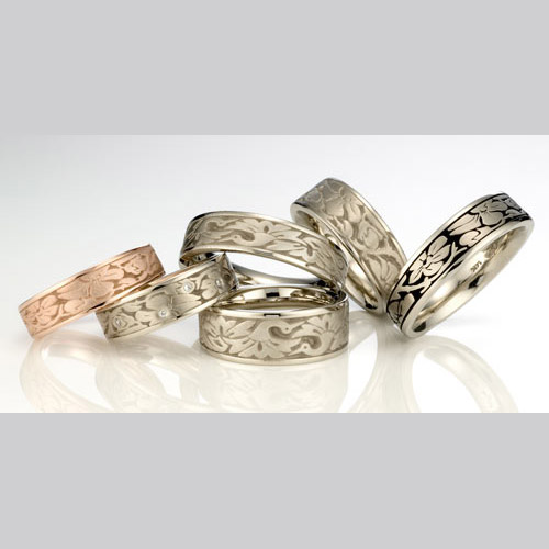 Located in northern California, Studio 311 is a small family owned business known for uniquely styled wedding bands and engagement rings. Each piece of jewelry is hand crafted with precious metals and stones here in the studio, reflecting the respect they have for the traditions of fine jewelry technique and ensuring a high level of quality and a consistent attention to detail. 
<br><br>
The rich traditions of the Celtic, African and Native American cultures inspire their original patterns. The symbols and shapes are gathered from items as diverse as fabric borders, book ornamentation and ancient armor.
<br><br>
As hands-on owners, Eric and Krista are involved in all aspects of the company, from design and metalsmithing, to customer service on phones, to sweeping floors on Fridays. Studio 311 is an environmentally responsible company, and for years has ordered from a metal and findings supplier who is an industry role-model for low impact practices and provides recycled raw materials via their Eco-Gold program.